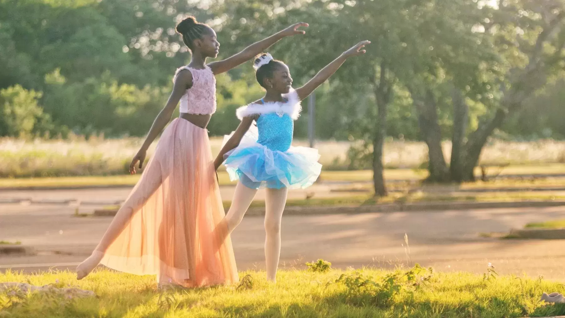 Two girls practicing ballet